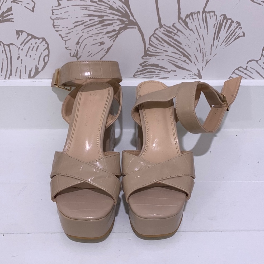 Nude Heels Size 7 with wedge back